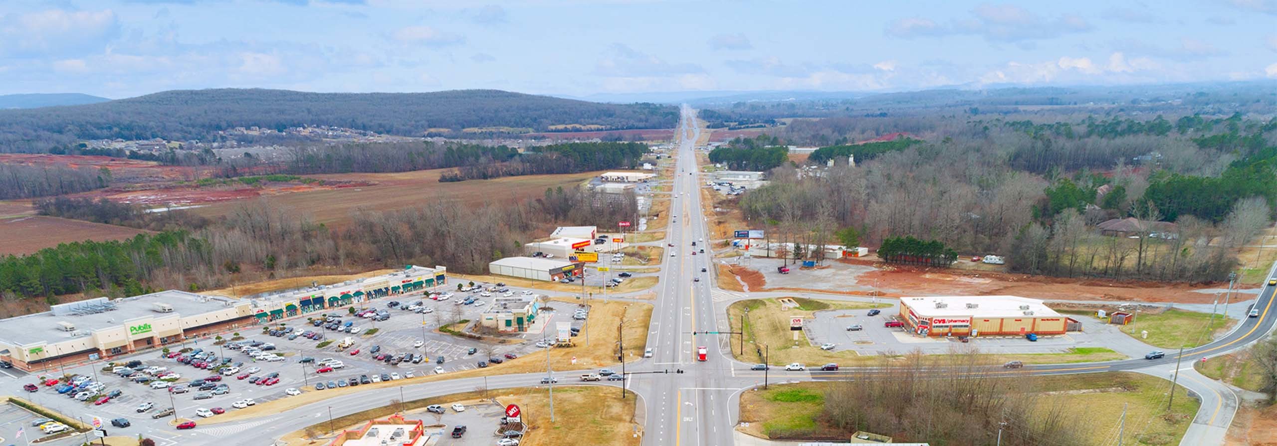 An aerial view of a road that runs through Harvest, Alabama